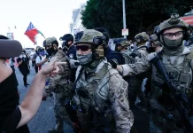 U.S. California bans masks for immigration agents during operations
