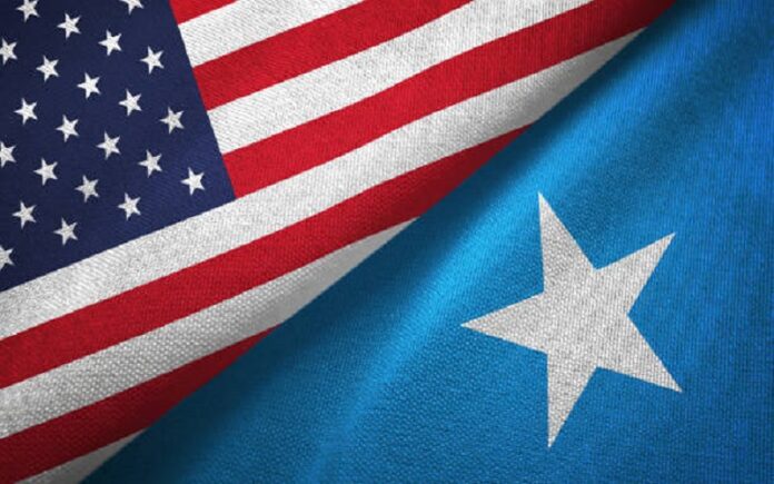 Somalia and United States flags together textile cloth, fabric texture